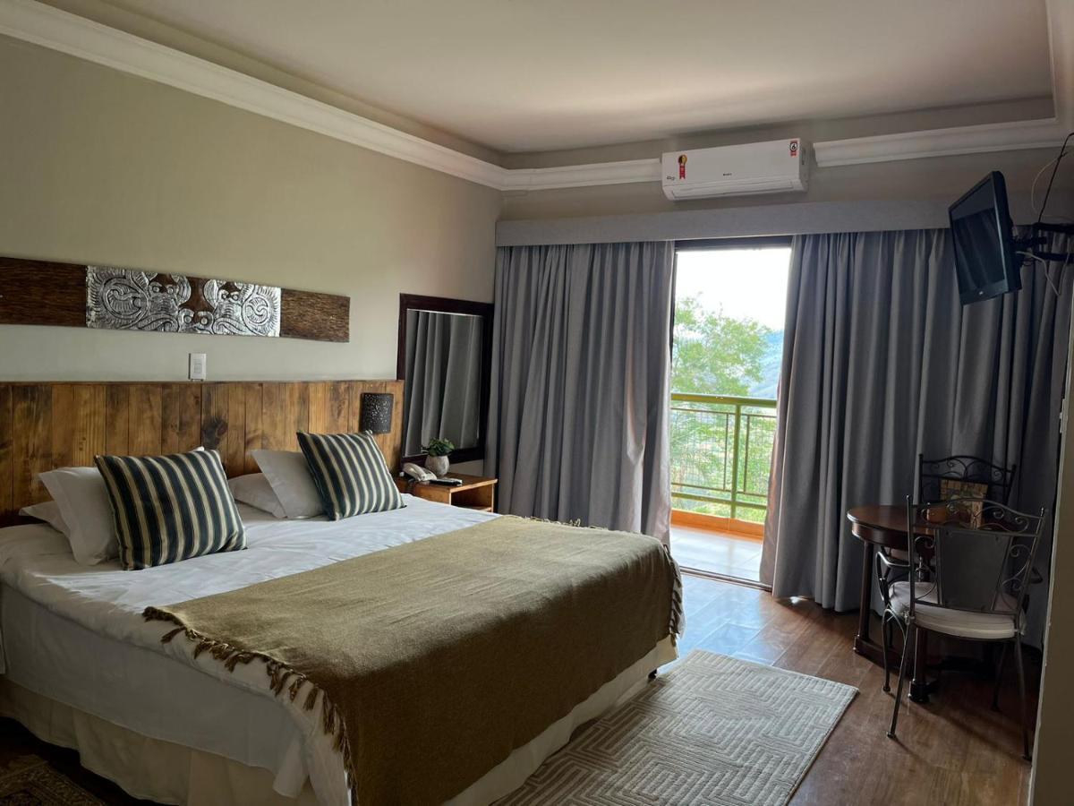 Hotel Pousada Shangri-La Серра-Негра Экстерьер фото